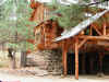 Log homes stone foundation big logs resized.JPG (103868 bytes)